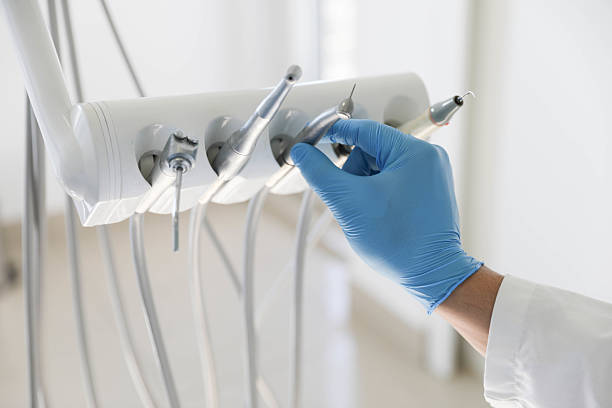 Professional Invisalign Clear Aligners technician working in DeWitt, IA